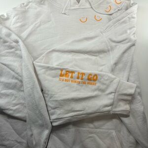 White Hoodie with Orange Smiley Faces and Text